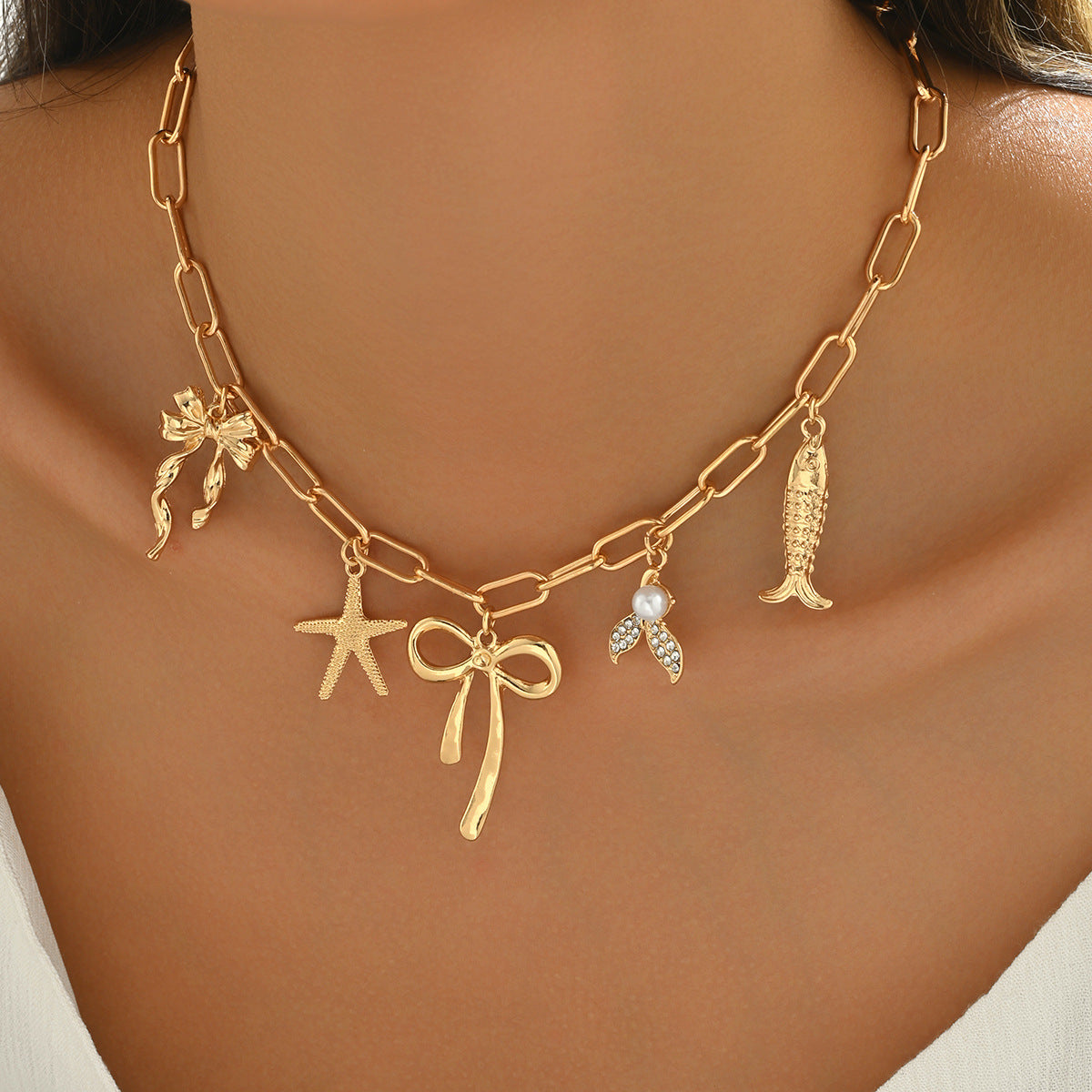 Collana multi-ciondolo con fiocco a stella a cinque punte tempestato di coda di pesce e coda di pesce all'ingrosso