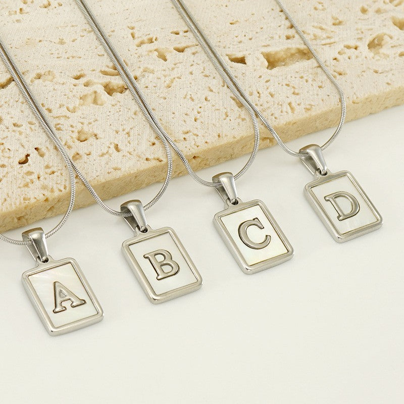 Wholesale stainless steel three-dimensional shell letter necklace