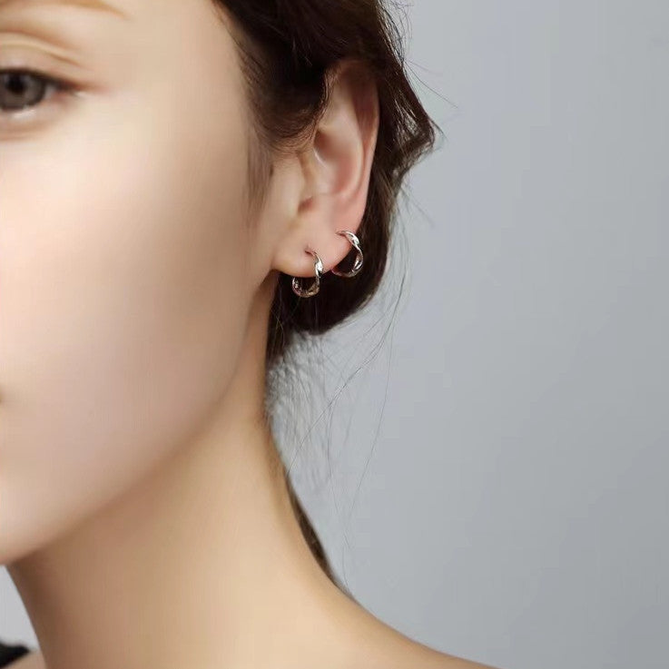 Wholesale s999 Sterling Silver Elegant Mobius Earrings Light Luxury Earrings