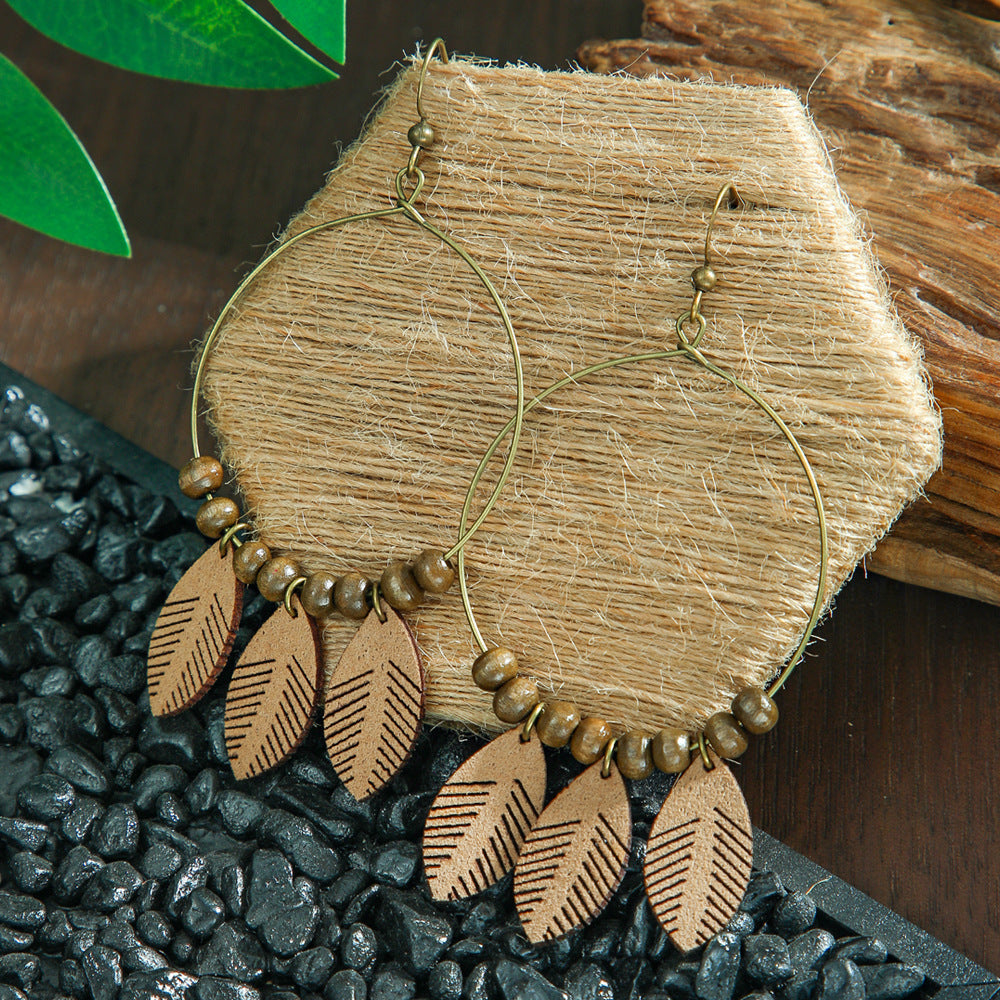 Wholesale Bohemian Tassel Earrings Metal Leather Leaf Circle Fashion Accessory for Party Wear