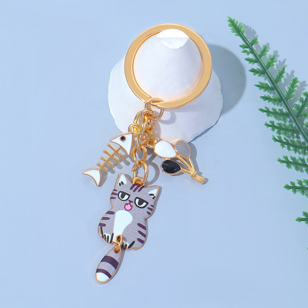 Wholesale Zinc Alloy Cartoon Cat Keychain With Movable Tail Trendy Animal Design Bag Charm Or Car Key Accessory Electroplated Finish Fashion Accessory For Gift And Boutique Resale
