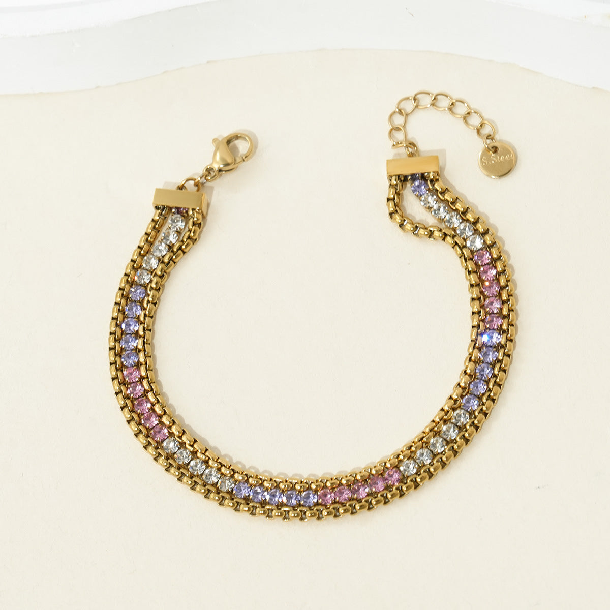 Wholesale Stainless steel bracelet with multiple layers and diamond embellishments.