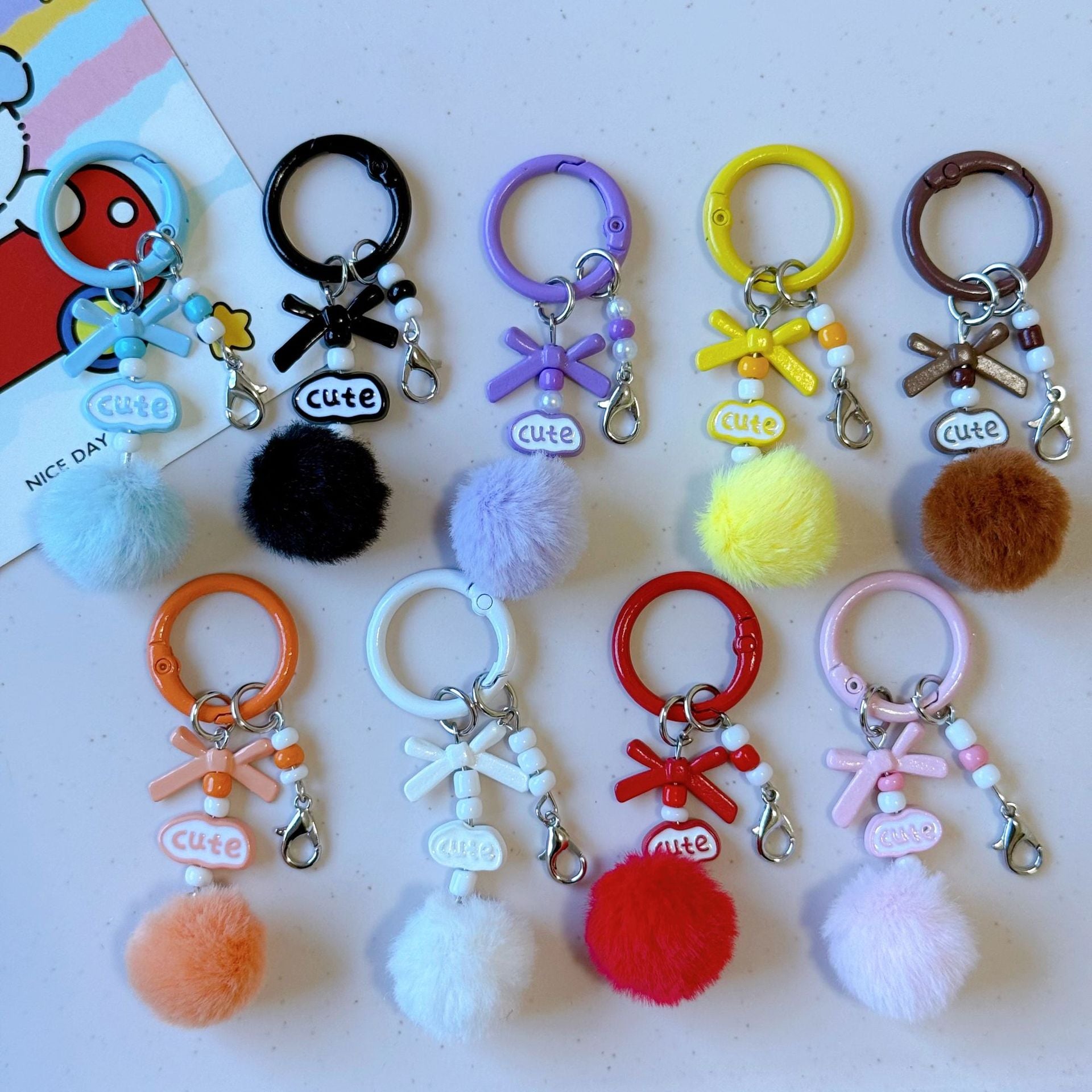 Wholesale Stylish DIY Cute Keychain Craft Kit Metal Lobster Clasps Beads Pom Poms Bows For Bag Charm Car Key Accessory Boutique Resale