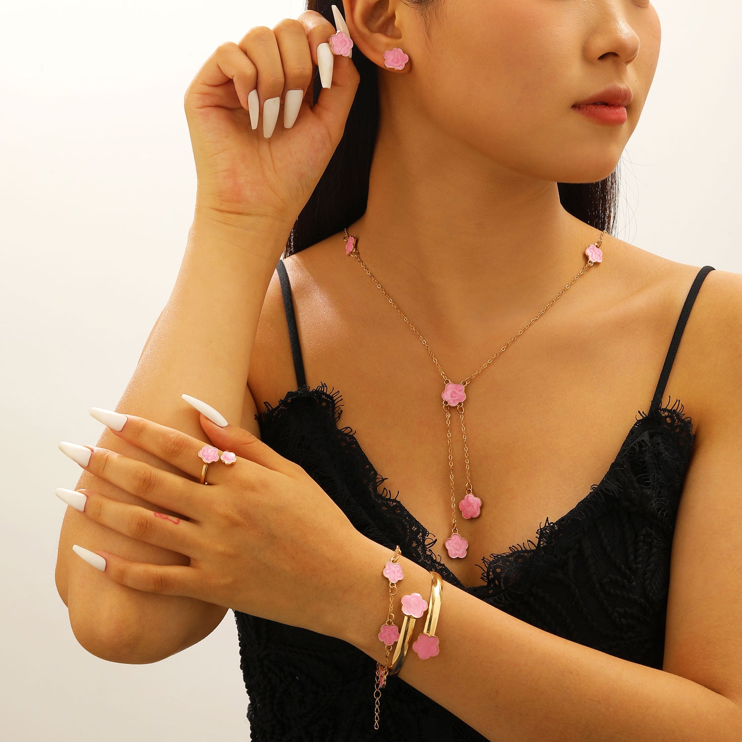 Collana, bracciale e orecchini con quadrifoglio all'ingrosso