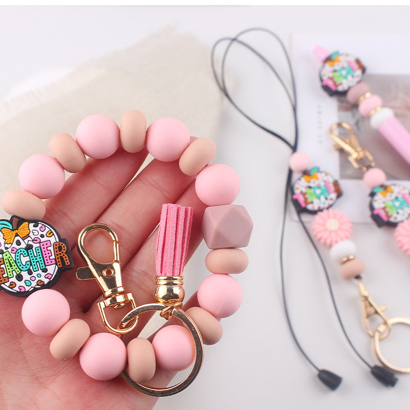 Wholesale Cartoon Teacher's Day Apple Silicone Accessories Pendant Creative DIY Four-Piece Combination Wrist Keychain