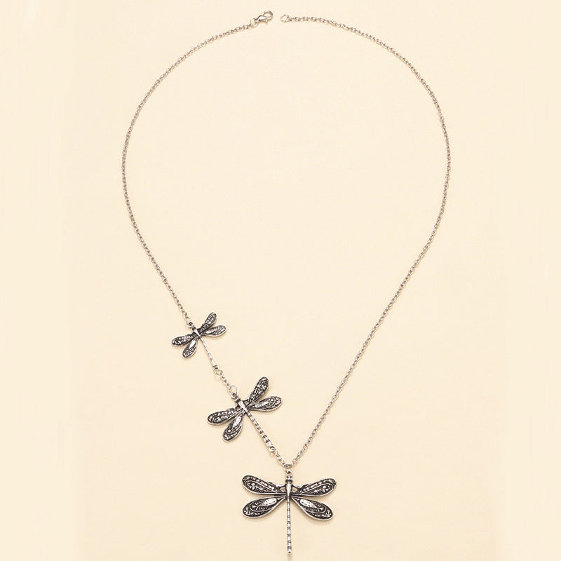 Wholesale Aliexpress Cross-Border New Carved Tribal Pattern Dragonfly Pendant Asymmetric Design Dragonfly Retro Sweater Chain
