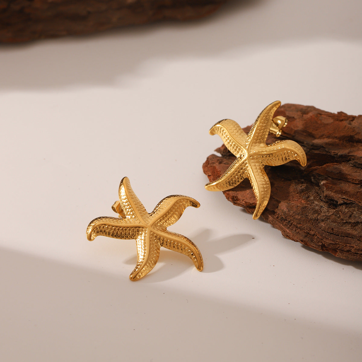 Wholesale ocean series stainless steel earrings exaggerated sea mans star earrings