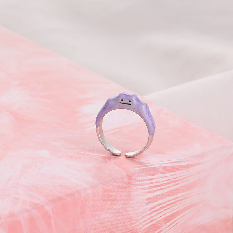 Wholesale  purple treasure change cute smiling face monster ring