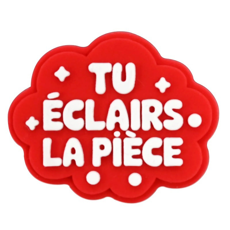 Serie di frasi francesi casuali all'ingrosso da 100 pezzi di cartoni animati di zoccoli Decorazione con fibbia per scarpe in gomma morbida in PVC