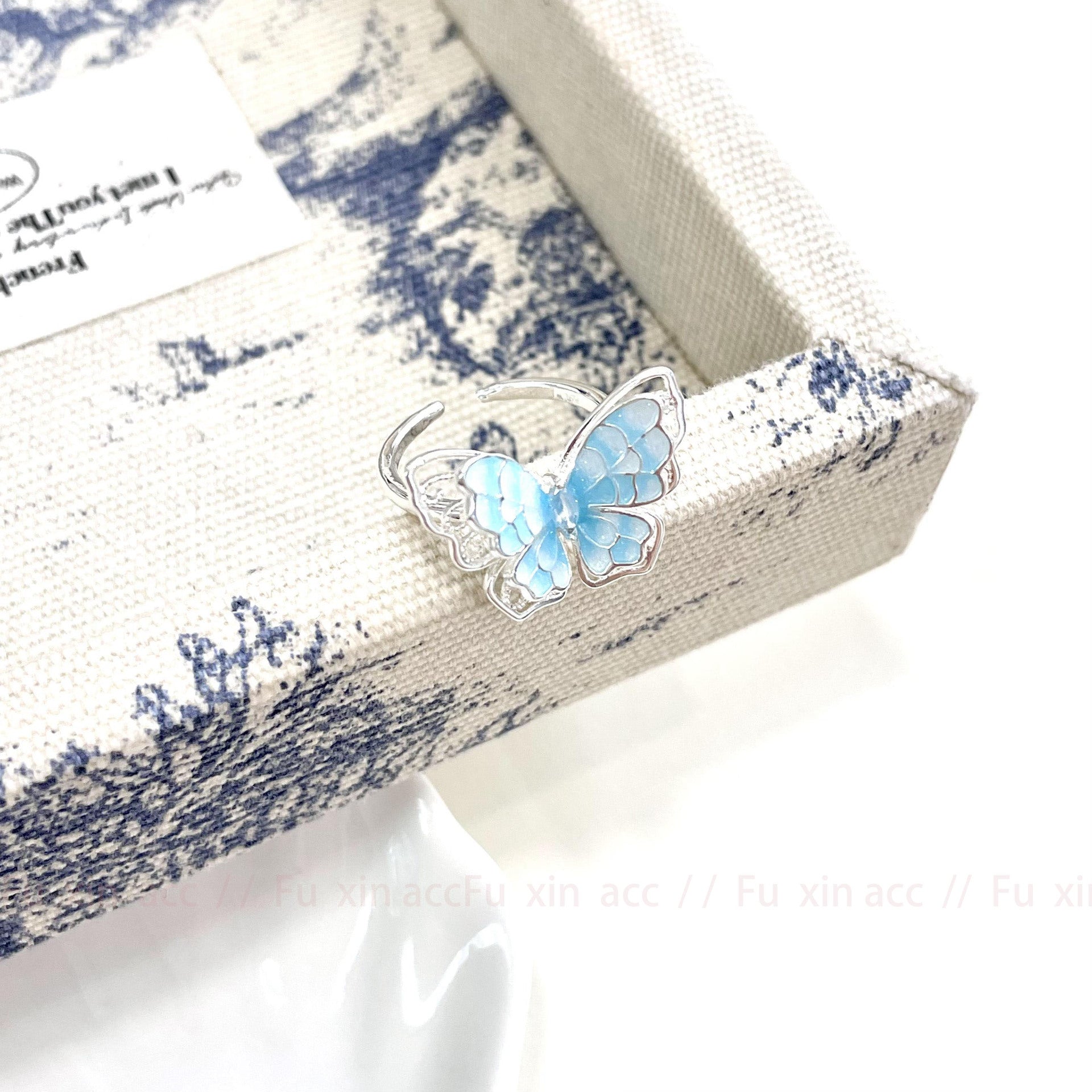 Wholesale  gradient blue and white double-layer hollow butterfly ring