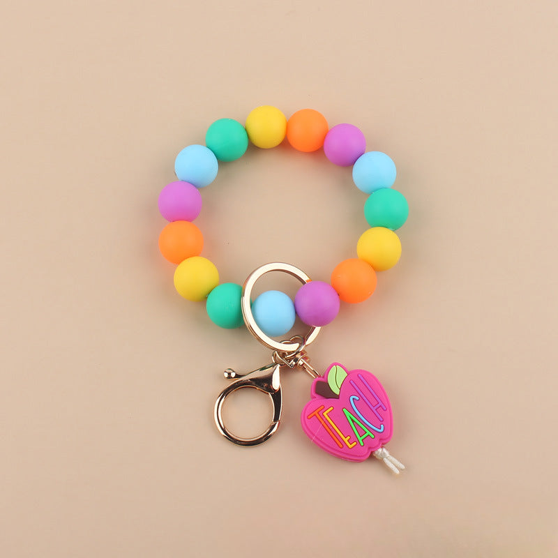 Wholesale Cartoon Apple Teacher Pencil Silicone Beaded Wrist Keychain