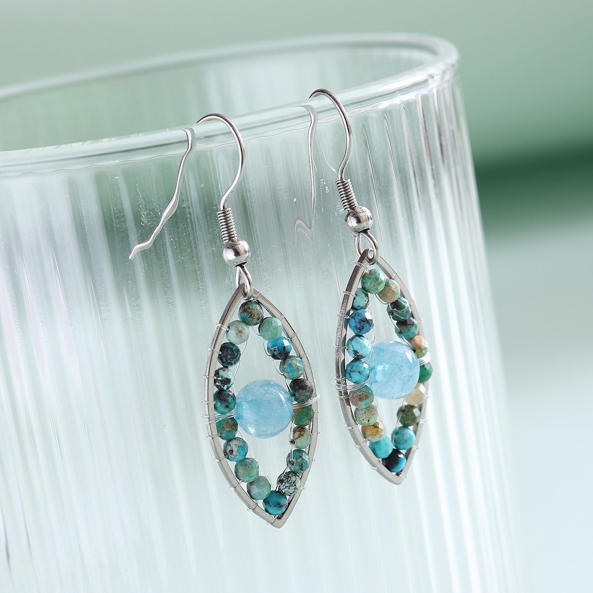 Wholesale Natural Stone Lycopodium Beads Devil's Eye Stainless Steel Earrings ACC-ES-MoAo001