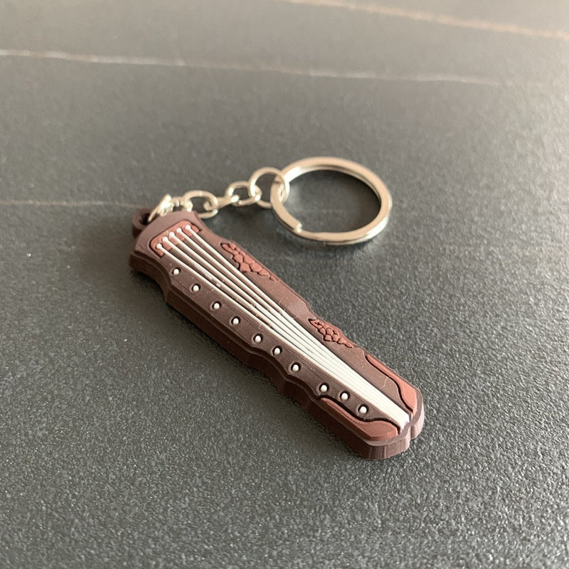 Wholesale Chinese Style Cartoon Guitar Keychain Pendant PVC Resin Epoxy Finish Ukulele Bag Charm Gift